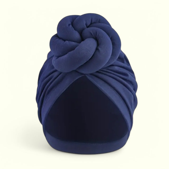 Summer-ready blue turban headwrap with a trendy knot.