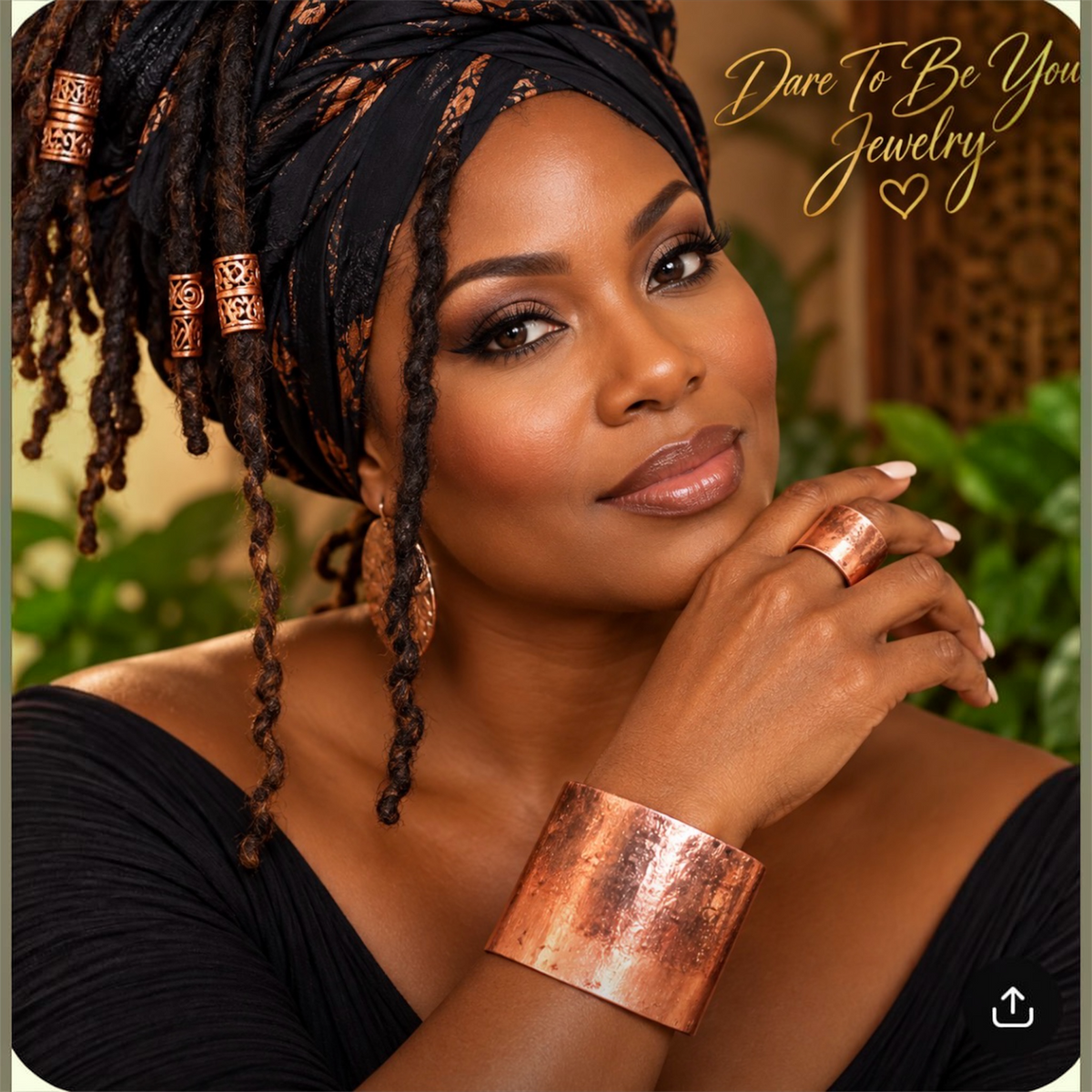 Black woman wearing handmade hammered pure copper cuff bracelet and matching copper ring