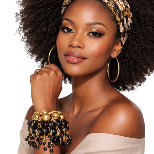 Afrocentric gold and black chunk wood bead bracelet stack worn by brown skin woman with natural afro and headband