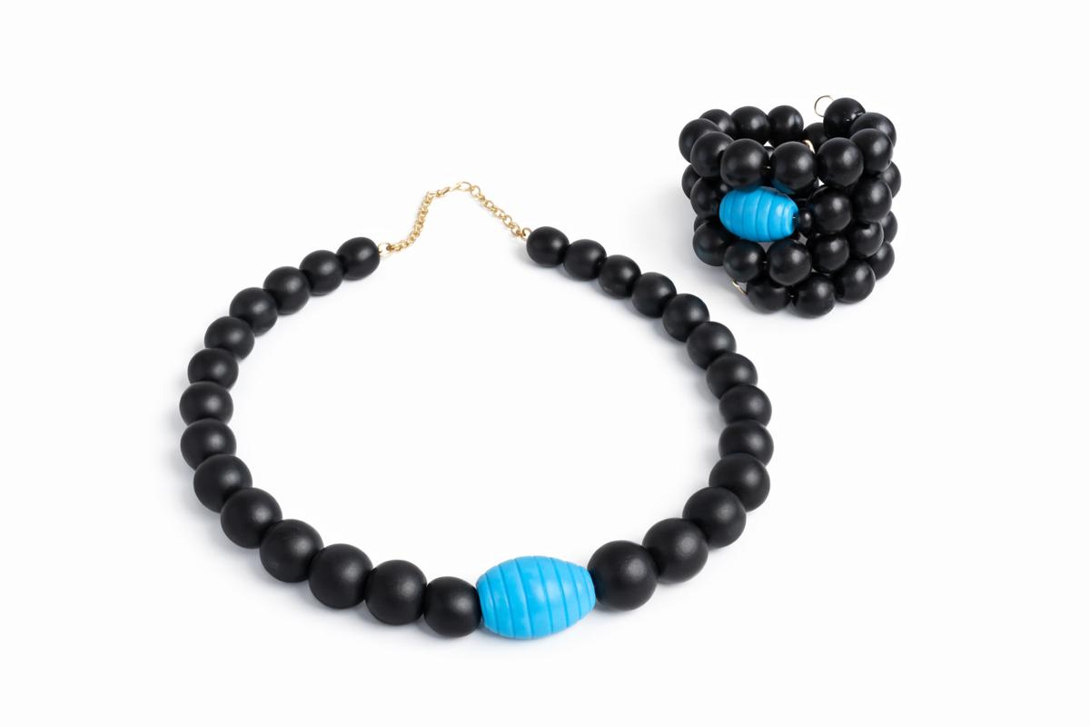 Midnight Crown Afrocentric necklace and 3-stack bracelet set featuring handcrafted matte black wood beads with turquoise focal accents - bold statement jewelry for women