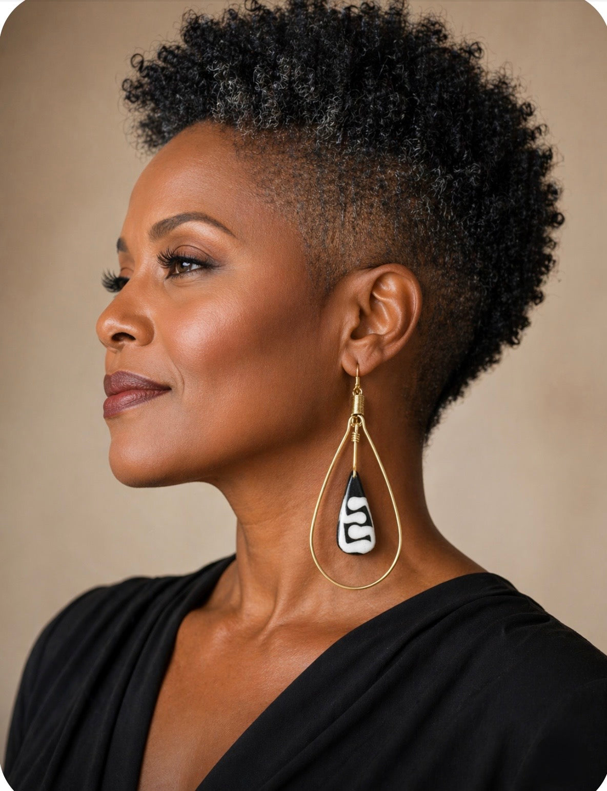 Afrocentric Gold Teardrop Earrings with Carved Bone Drop
