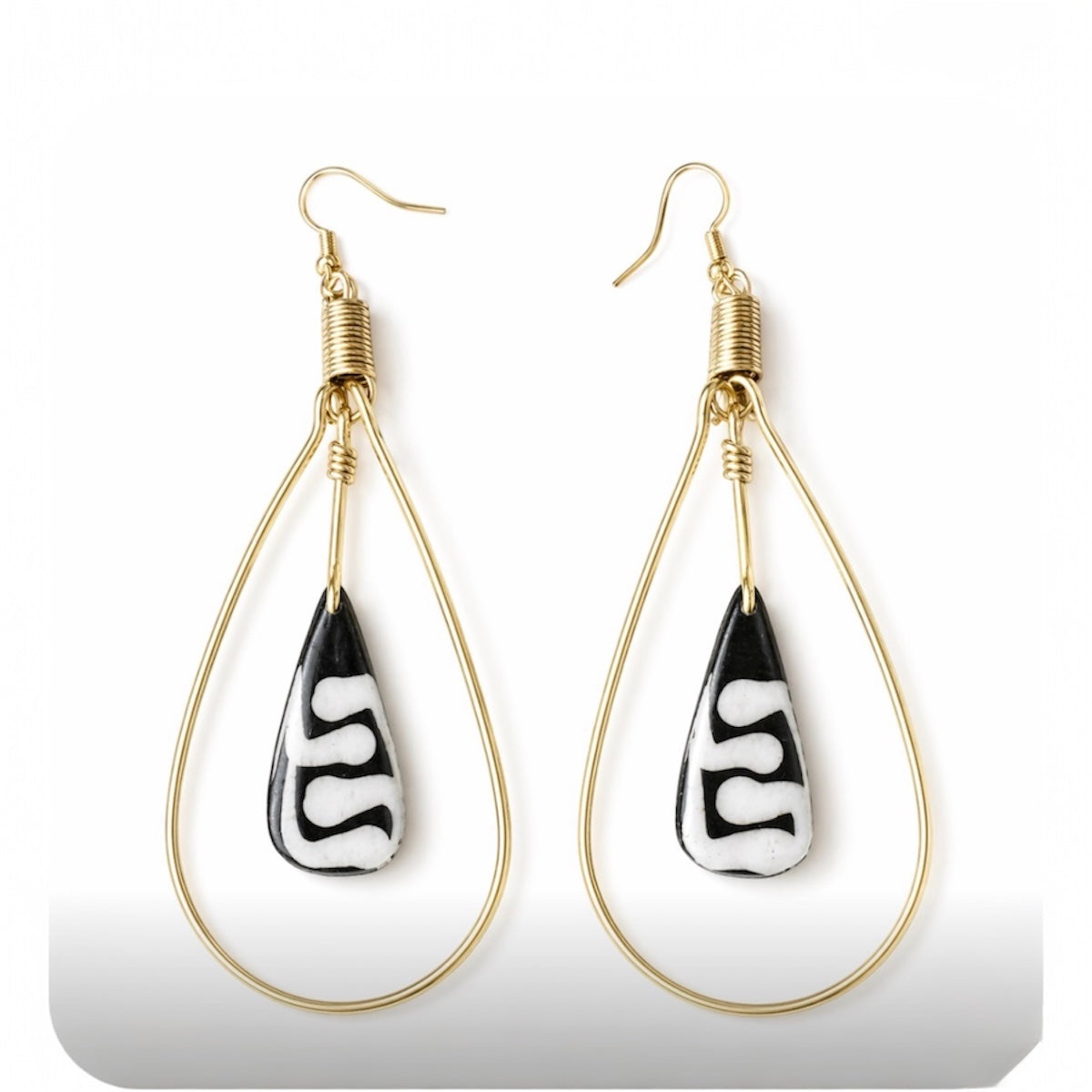 Afrocentric Gold Teardrop Earrings with Carved Bone Drop