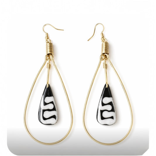 Afrocentric Gold Teardrop Earrings with Carved Bone Drop