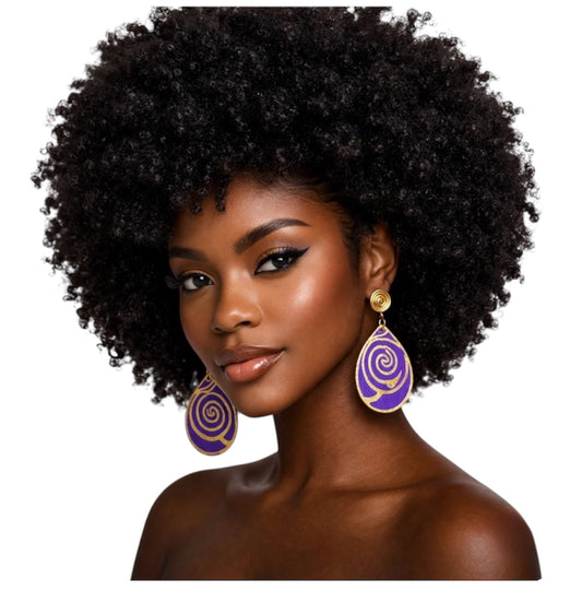 Dark skin woman with large kinky Afro wearing purple and gold Afrocentric statement earrings on clean white background