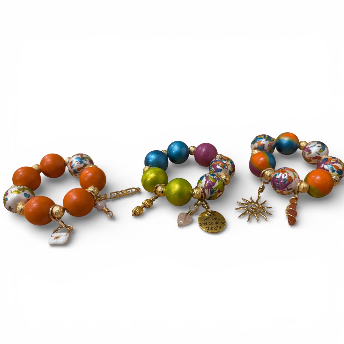 Afrocentric chunky wood bead bracelet stack set with hand painted beads and inspirational charm bracelets