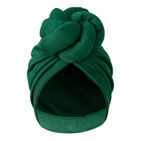 Stylish green turban headwrap, oversized and knotted for a fashionable look.