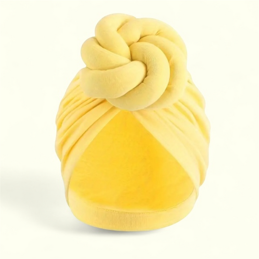 Stylish, oversized yellow turban headwrap, perfect for summer.