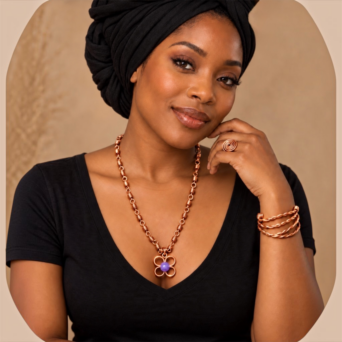 Black woman wearing Lavender Bloom handmade copper flower necklace with lavender glass bead